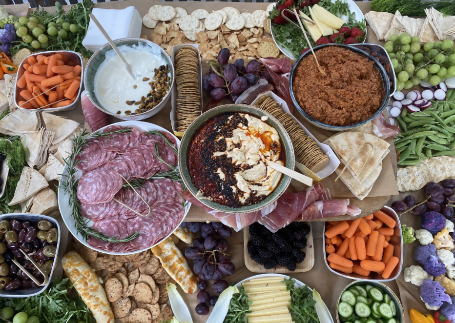 Elegant charcuterie board prepared by personal chef in DC featuring seasonal cheeses, cured meats, fresh fruit, and nuts
